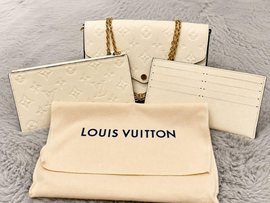 Louis Vuitton Monogram Empreinte Wallet Pouch Card Holder Set (Category: Luxury Bags & Wallets) located in Manila. Submitted by lumangukay (Listing ID 1461143576, Image 1). Description: - Authentic Louis Vuitton Set - Color: Cream/Beige - Includes: Envelope Wallet with Chain, Zip Pouch, Card Holder - Pattern: Embossed Monogram Empreinte - Comes with: Dust Bag - Ideal for: Organizing essentials or as a gift.