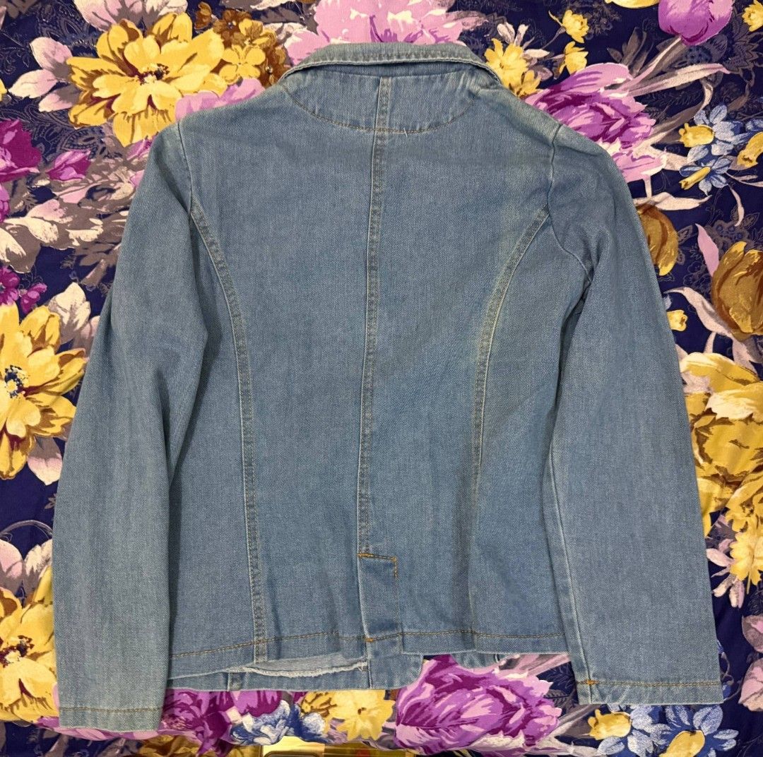 lovely jeans light wash denim blazer jacket (Category: Coats, Jackets and Outerwear) located in Manila. Submitted by laurloopsy (Listing ID 1461284304, Image 3). Description: - fits size M to L - classic light wash denim blazer - has a single 'lovely jeans' button front closure - great for layering - has functional pockets.