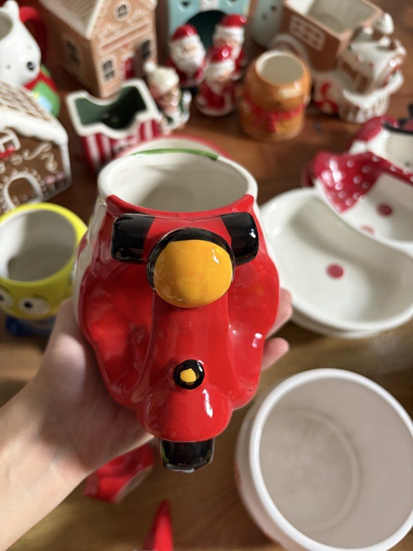 Lugano Caffè Scooter Mug (Category: Coffee & Tea Tableware) located in Manila. Submitted by itsandrea (Listing ID 1461271747, Image 2). Description: - Fun scooter-shaped mug from Lugano Caffè - Features a red and white design with Italian flag colors - Perfect for enjoying coffee or tea - A unique collectible item - Ideal as a gift or for personal use.