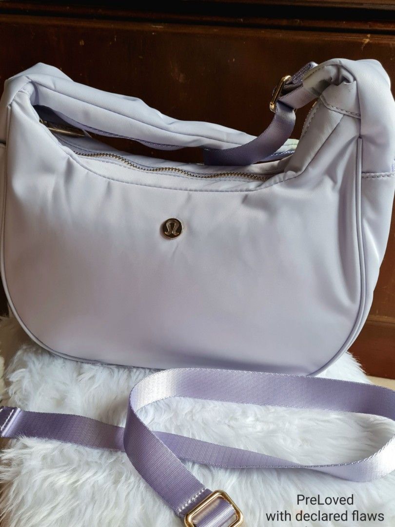 Lulu Dumpling bag in Purple (Category: Shoulder Bags) located in Quezon City. Submitted by missmaui (Listing ID 1461295457, Image 1). Description: Used once Visible color transfer but can be washed out with strap.