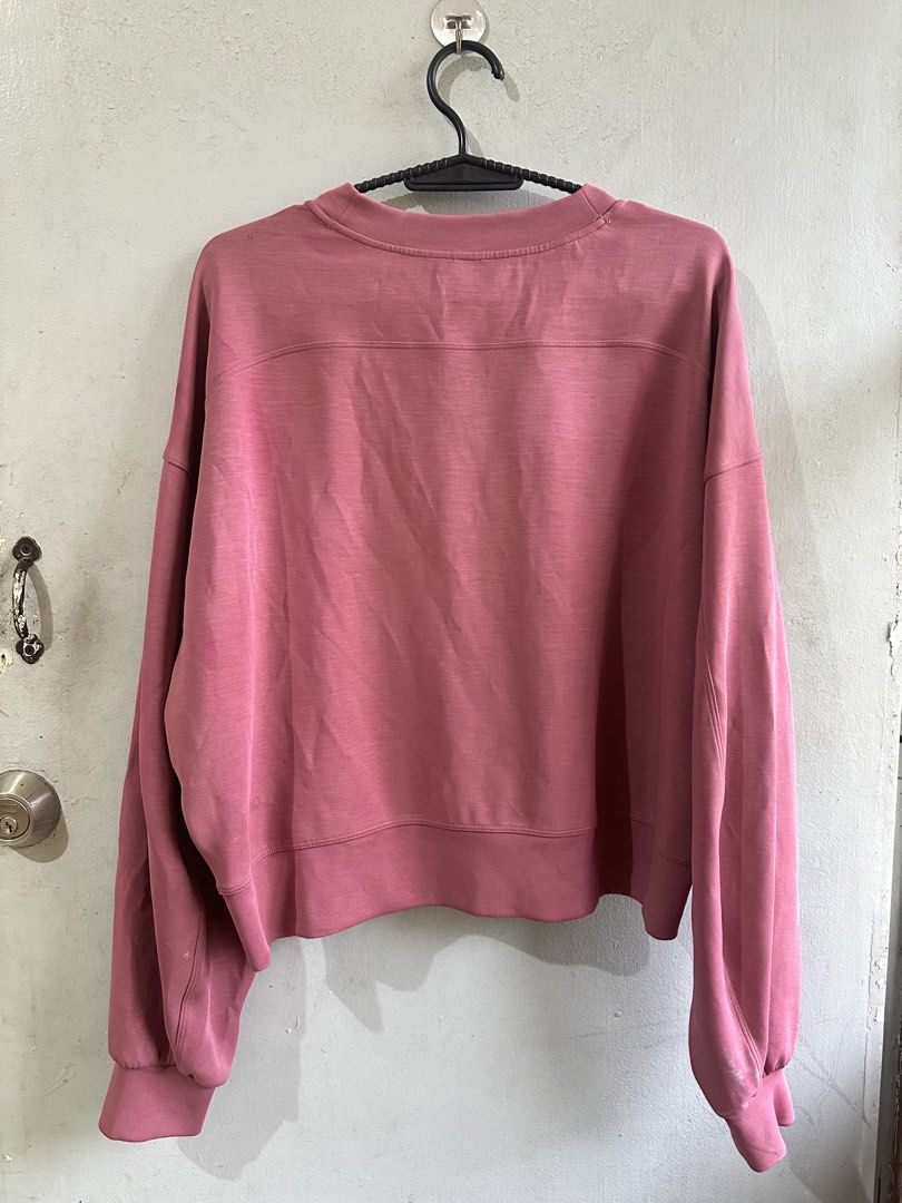 Lululemon Crewneck Sweatshirt Dusty Rose (Category: Longsleeves) located in Angeles City. Submitted by alejeong27 (Listing ID 1461156944, Image 2). Description: - Brand: Lululemon - Color: Dusty Rose - Style: Cropped Crewneck Sweatshirt - Features: Long sleeves with elastic cuffs - Fabric: Soft and comfortable - Details: Subtle embroidered Lululemon logo on the side - Occasion: Casual wear, easy to pair with leggings or jeans.