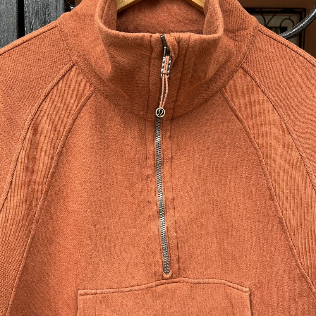 Lululemon Cropped Half-Zip Sweatshirt - Burnt Orange (Category: Coats, Jackets and Outerwear) located in Cebu City. Submitted by booksii3232 (Listing ID 1461178549, Image 3). Description: - Lululemon cropped sweatshirt in burnt orange - High neck with half-zip closure - Convenient kangaroo pocket - Thumbholes at the cuffs for extra warmth - Cozy soft fleece interior - Versatile for layering or standalone wear - Comfortable and stylish design 1250