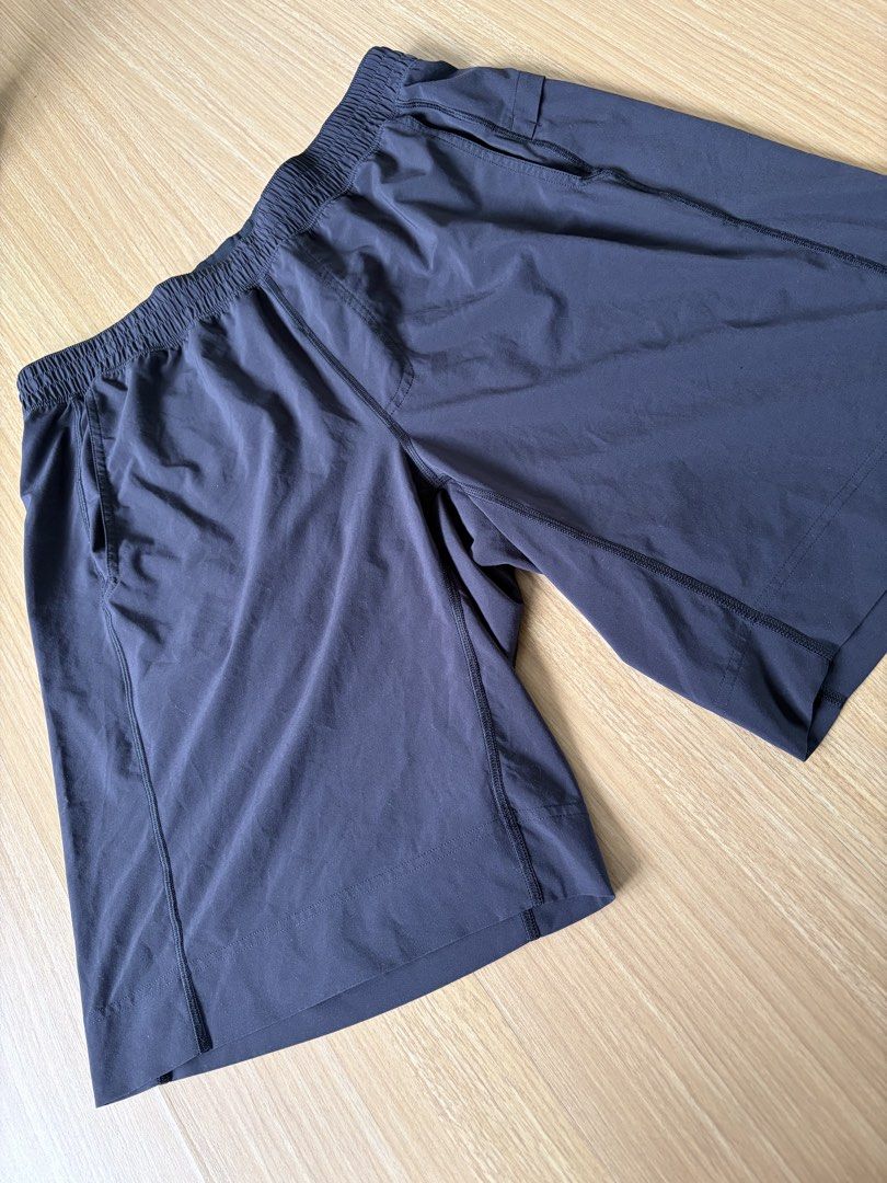 Lululemon Men's Shorts Dark Grey Size M (Category: Shorts) located in Makati City. Submitted by citysunset (Listing ID 1461143515, Image 2). Description: - Lululemon Men's Athletic Shorts - Color: Dark Grey - Size: XL - Waist: 33 (stretchable) - Length: 20.5 inches - Features: Elastic waistband with drawstring, two side pockets - Material: Lightweight and quick-drying - Ideal for: Gym, running, or any athletic activity - Condition: Great, well-ma