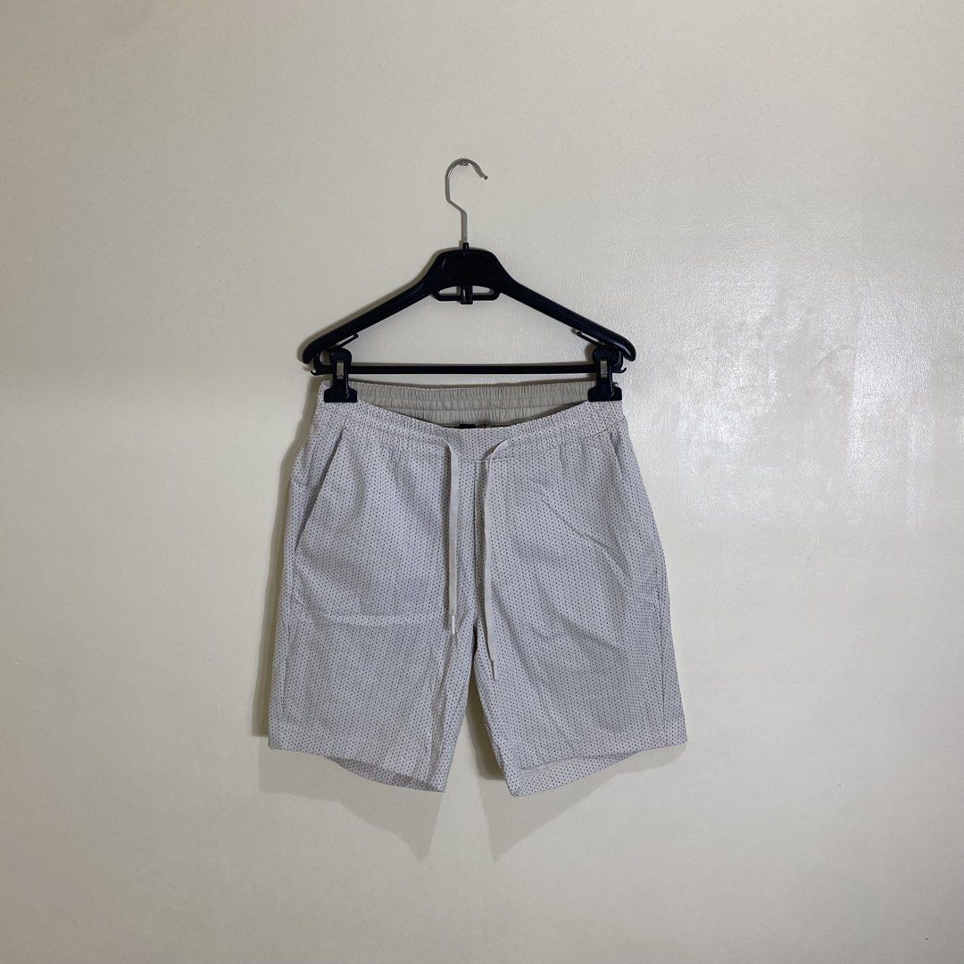 Lululemon Shorts S/P 180/76Y White Dot Pattern (Category: Activewear) located in Manila. Submitted by carbertjakosalem (Listing ID 1461311181, Image 1). Description: - Lululemon shorts - Size: S/P - Color: White with subtle dark dot pattern - Features: Elastic waistband with drawstring, front pockets, back pocket - Material: Made in Vietnam - Ideal for: Workouts, casual wear.