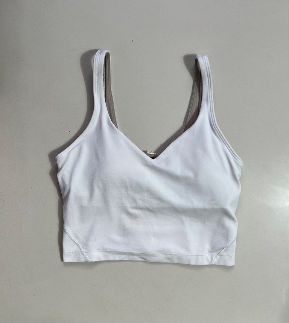 Lululemon White Align Tank Top Size 4 (Category: Activewear) located in Manila. Submitted by thriftfinds_309 (Listing ID 1461303629, Image 3). Description: - White Lululemon Align Tank Bra - Size: 4 - Features built-in bra for support - Ideal for yoga sessions or everyday comfort - Made with soft and comfortable fabric - Showcases the iconic Lululemon logo - no issues Lp posted .