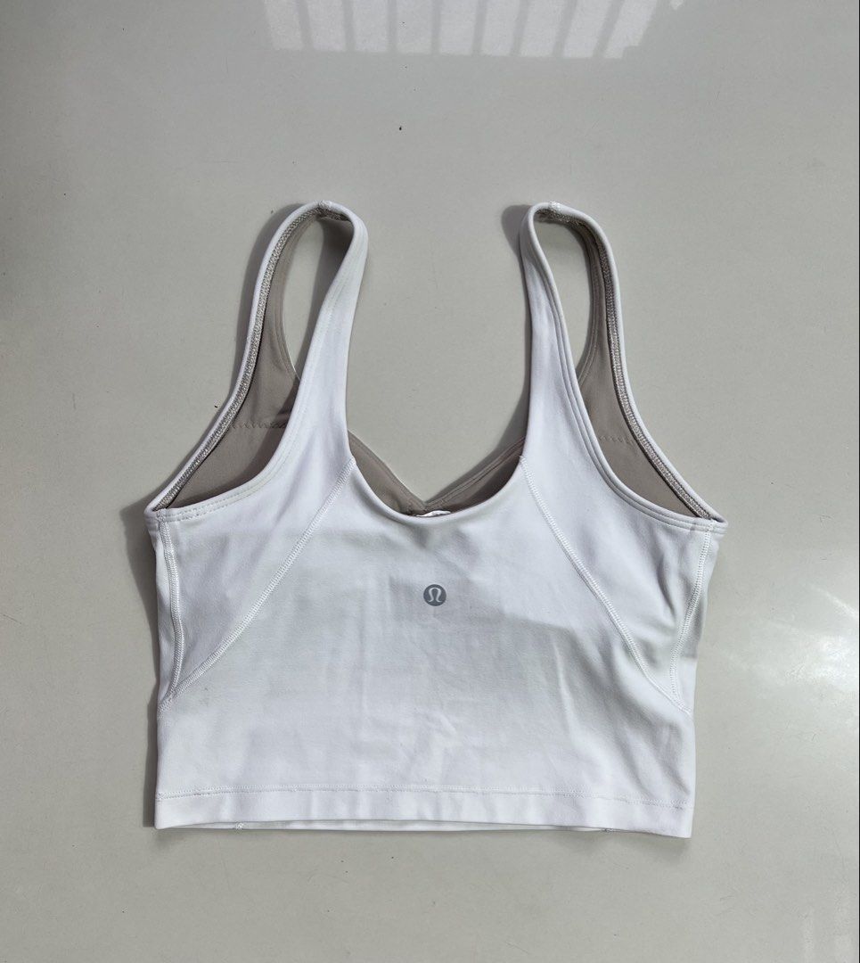 Lululemon White Align Tank Top Size 4 (Category: Activewear) located in Manila. Submitted by thriftfinds_309 (Listing ID 1461303629, Image 2). Description: - White Lululemon Align Tank Bra - Size: 4 - Features built-in bra for support - Ideal for yoga sessions or everyday comfort - Made with soft and comfortable fabric - Showcases the iconic Lululemon logo - no issues Lp posted .