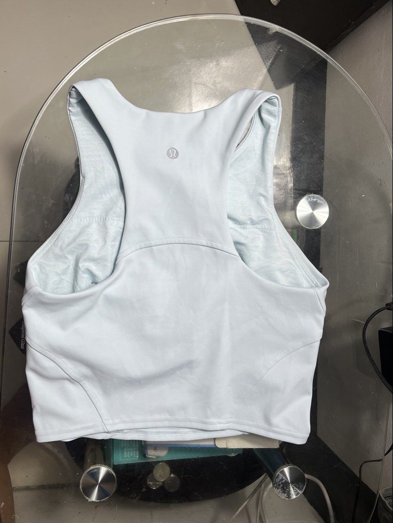 Lululemon Wunder Train Racerback Tank Top Chambray "4 (Category: Activewear) located in Manila. Submitted by thriftfinds_309 (Listing ID 1461299269, Image 3). Description: - Grey Lululemon cropped sports bra - Comfortable racerback design - Soft and smooth fabric - Ideal for workouts or everyday wear - Looks great with high-waisted leggings.