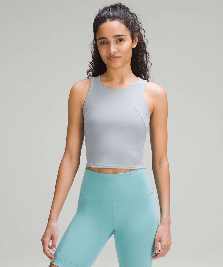 Lululemon Wunder Train Racerback Tank Top Chambray "4 (Category: Activewear) located in Manila. Submitted by thriftfinds_309 (Listing ID 1461299269, Image 2). Description: - Grey Lululemon cropped sports bra - Comfortable racerback design - Soft and smooth fabric - Ideal for workouts or everyday wear - Looks great with high-waisted leggings.