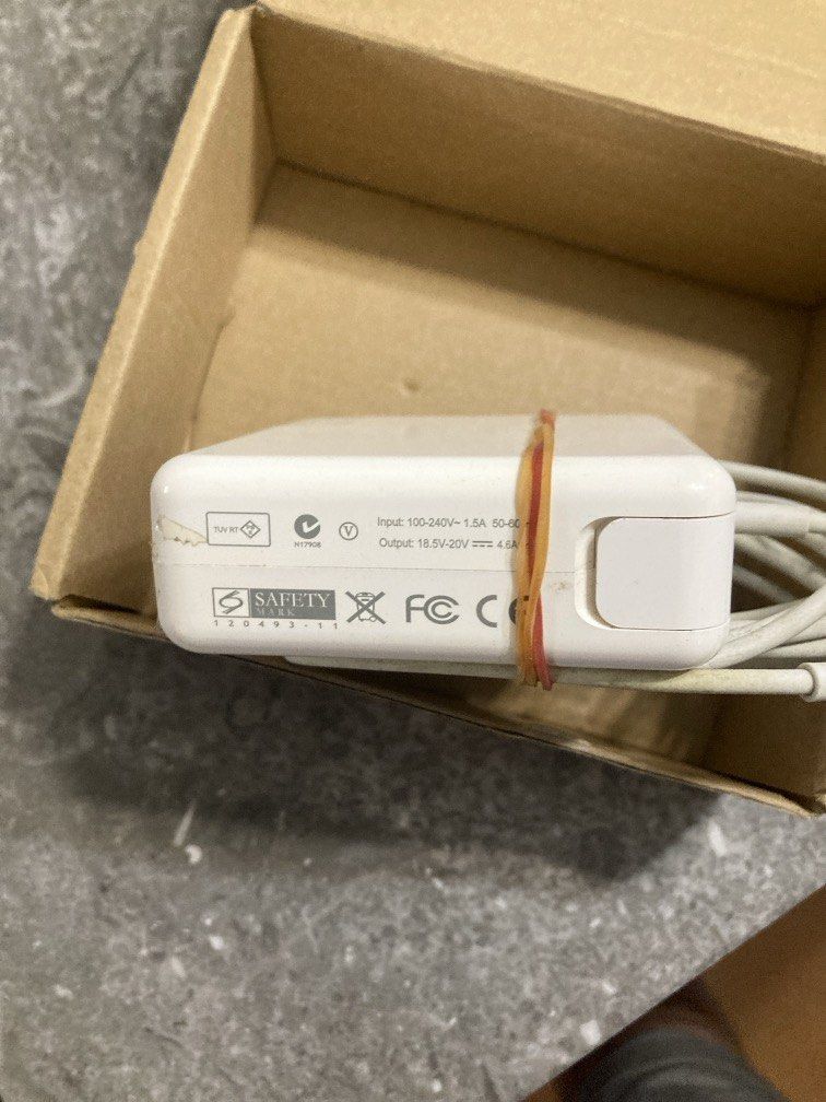 Macbook pro charger (Category: Cables & Adaptors) located in Paniqui. Submitted by swiftdragon.c69cc8 (Listing ID 1461204670, Image 3). Description: 65 w.