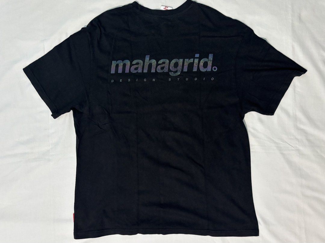 MAHAGRID T-SHIRT (Category: Tshirts & Polo Shirts ) located in Manila. Submitted by tindero_ng_ano (Listing ID 1461180356, Image 2). Description: MAHAGRID T-SHIRT -Size on tag: Medium Asian Men’s (Fits Large) -Dimensions: Width (Pit to Pit): 23” Length: 29.5” -Color Rate: 7/10 -Condition: Used / No issue -Price: 250 -Rfs: Decluttering.