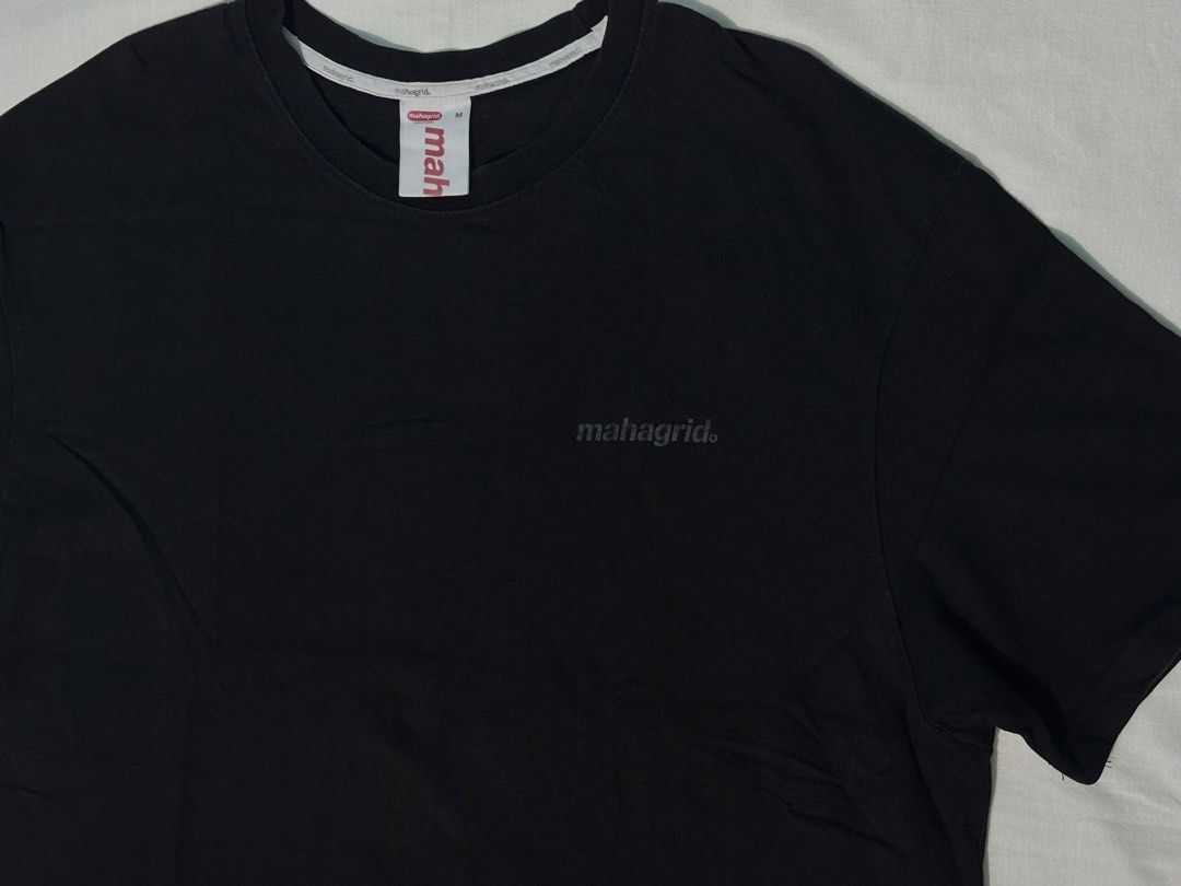 MAHAGRID T-SHIRT (Category: Tshirts & Polo Shirts ) located in Manila. Submitted by tindero_ng_ano (Listing ID 1461180356, Image 3). Description: MAHAGRID T-SHIRT -Size on tag: Medium Asian Men’s (Fits Large) -Dimensions: Width (Pit to Pit): 23” Length: 29.5” -Color Rate: 7/10 -Condition: Used / No issue -Price: 250 -Rfs: Decluttering.