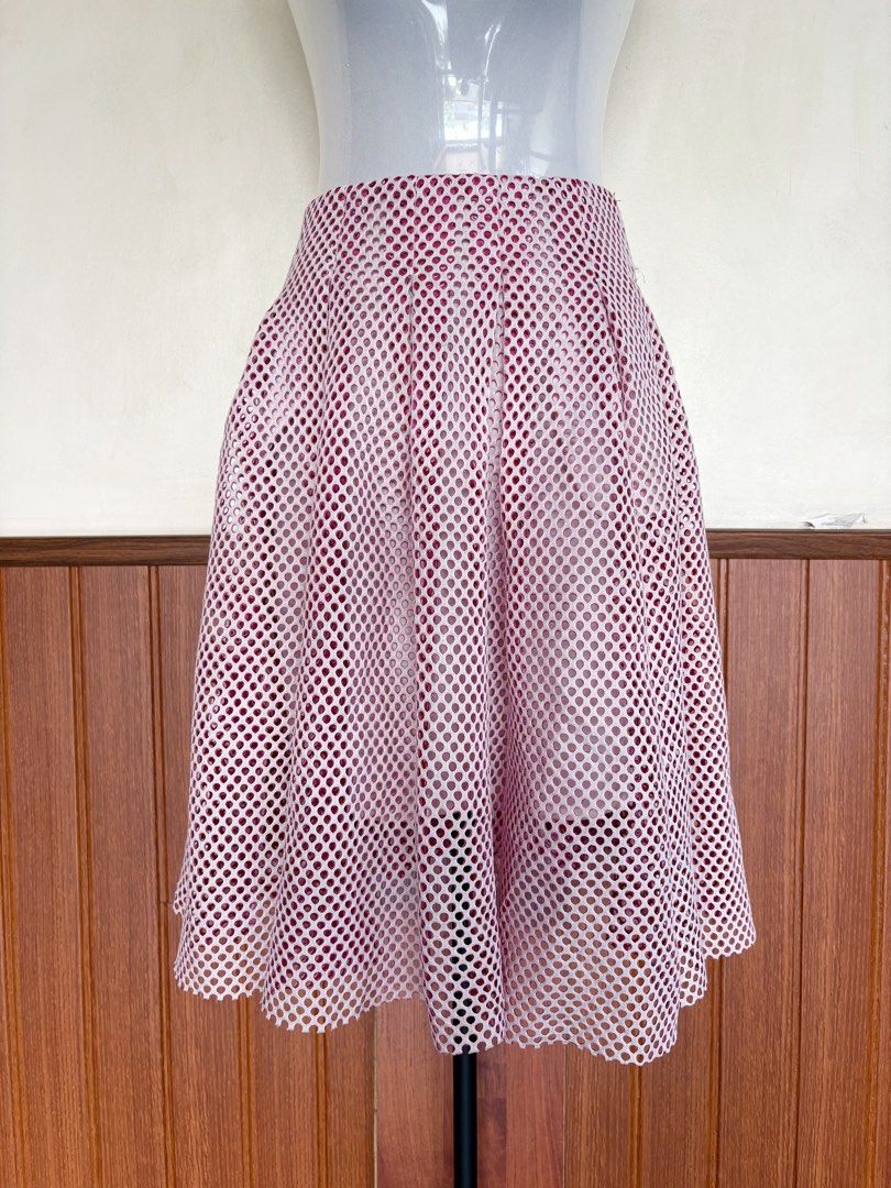 Maje Openwork Pink Knitted Midi Skirt (Category: Skirts) located in Cebu City. Submitted by stylingtrends.coll (Listing ID 1461183784, Image 2). Description: - Pink midi skirt with a stylish knit overlay. - Openwork pattern - Flattering pleated design. Waist: 28-29.