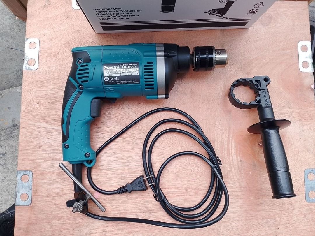 MAKITA HP1630 HAMMER DRILL (Category: Home Improvement Tools & Accessories) located in Manila. Submitted by 09171479278_elsie. (Listing ID 1461204560, Image 1). Description: MAKITA HP1630 HAMMER DRILL.