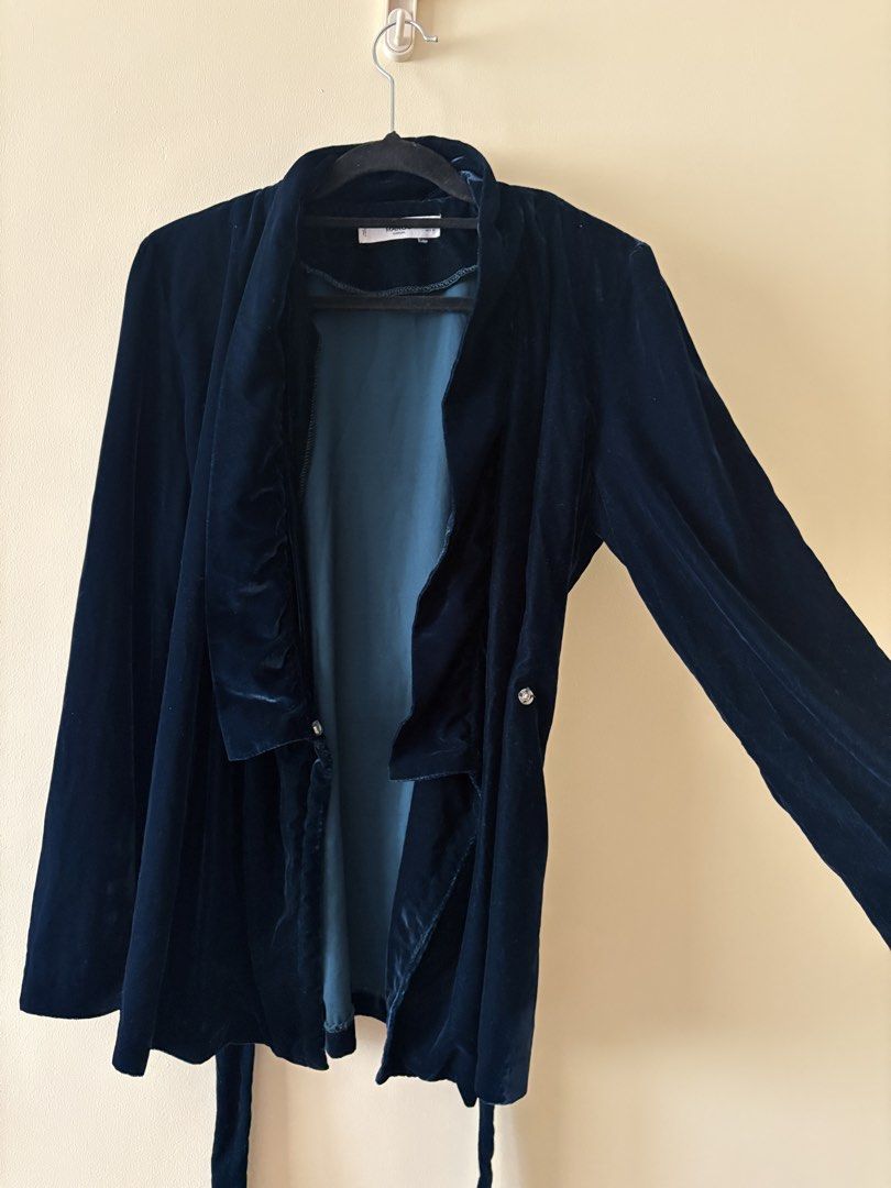 MANGO Velvet Wrap Blazer with Button Cuffs (Category: Coats, Jackets and Outerwear) located in Manila. Submitted by anabri (Listing ID 1461196446, Image 3). Description: - Green velvet blazer - Wrap style with tie belt - Long sleeves with button cuff details - Fully lined - Perfect for dressing up or down, ideal for evenings out - Fits S to semi M, in great condition .