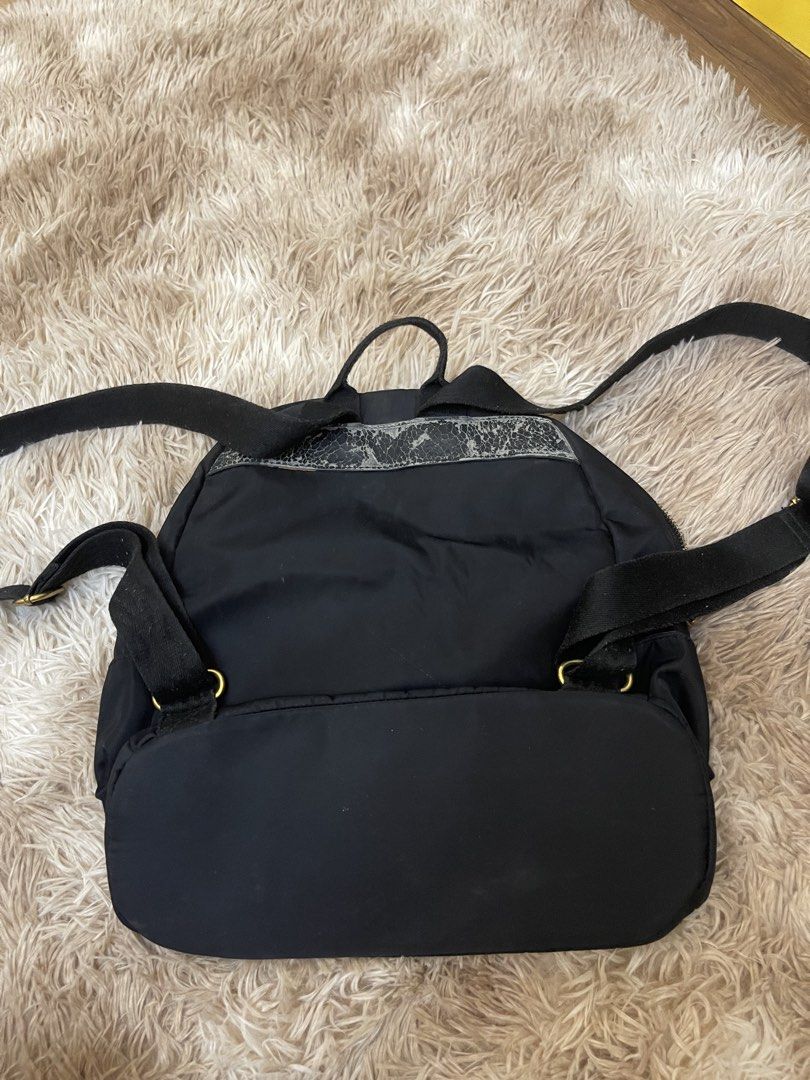 MARC JACOBS NYLON BACKPACK (Category: Backpacks) located in Concepcion. Submitted by wowsinigangmix (Listing ID 1461260676, Image 2). Description: MARC JACOBS NYLON/LEATHER BAG COLOR BLACK MEDIUM TO LARGE SIZE WELL-USED HAS FLAWS MANAGE EXPECTATIONS.