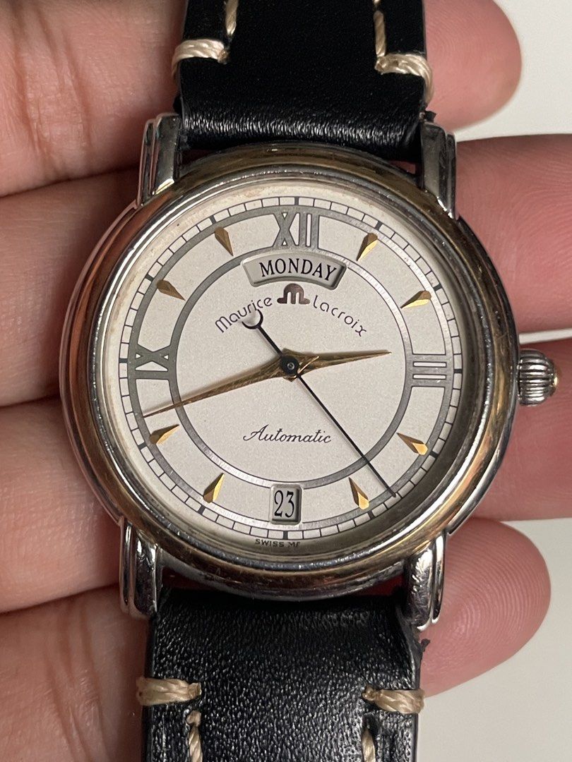 Maurice Lacroix Automatic (Category: Men's Watches) located in Taguig. Submitted by j_watches007 (Listing ID 1461175338, Image 3). Description: Authentic Secondhand ⌚ Maurice Lacroix Automatic Day/date Swiss Made 3102 09776 White dial with Roman numerals 18k Gold Bezel Sapphire crystal Stainless steel back case 34mm Replacement leather strap, buckle “Watch Only” DISCLAIMER: IT’S OLD USED WATCHES EXPECT SOME SCRATCHES, SIGNS OF USED & PLEASE MANAG