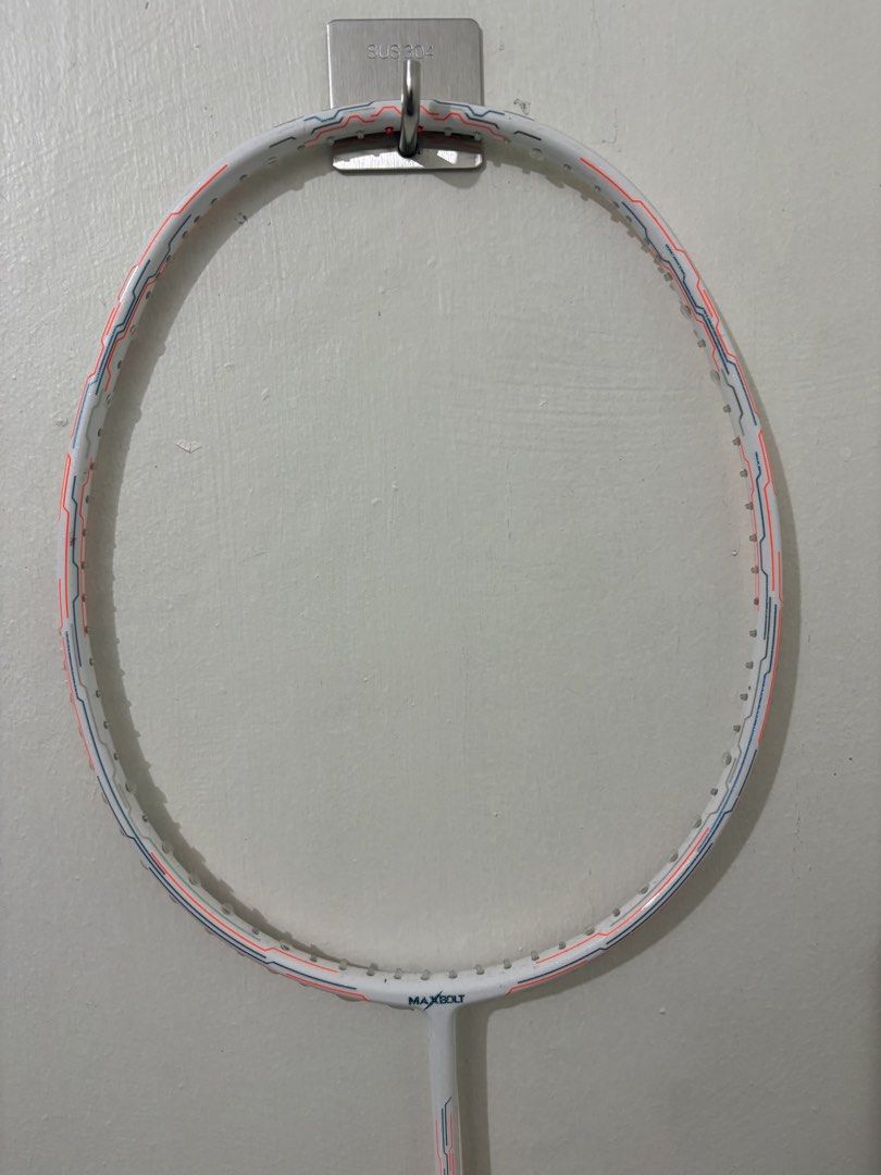 MAXBOLT Superstar LT Badminton Racquet (Category: Racket and Ball Sports) located in Bacoor. Submitted by supergamer_10 (Listing ID 1461220734, Image 3). Description: - MAXBOLT Superstar LT badminton racquet - Color: White with red and blue accents - Grip: Yellow - Ideal for playing badminton - Ready for your next game.