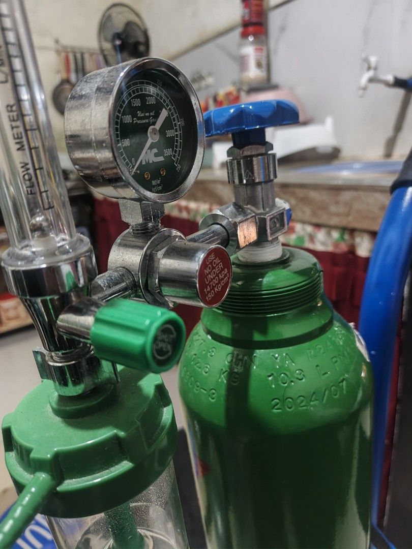 MC Oxygen Regulator with Tank and Trolley (Category: Medical Supplies & Tools) located in Pasig City. Submitted by urbanvoghue (Listing ID 1461116423, Image 3). Description: 13.4 Liter Portable Medical Oxygen Tank Assembly with Trolley and Regulator. ​Medical Oxygen Tank (Cylinder) ​Capacity / Volume: 1348 ​Material: Seamless Steel (painted standard medical green) MC brand -​Oxygen Regulator & Flowmeter Unit ​Trolley Cart ​Construction: Powder-co