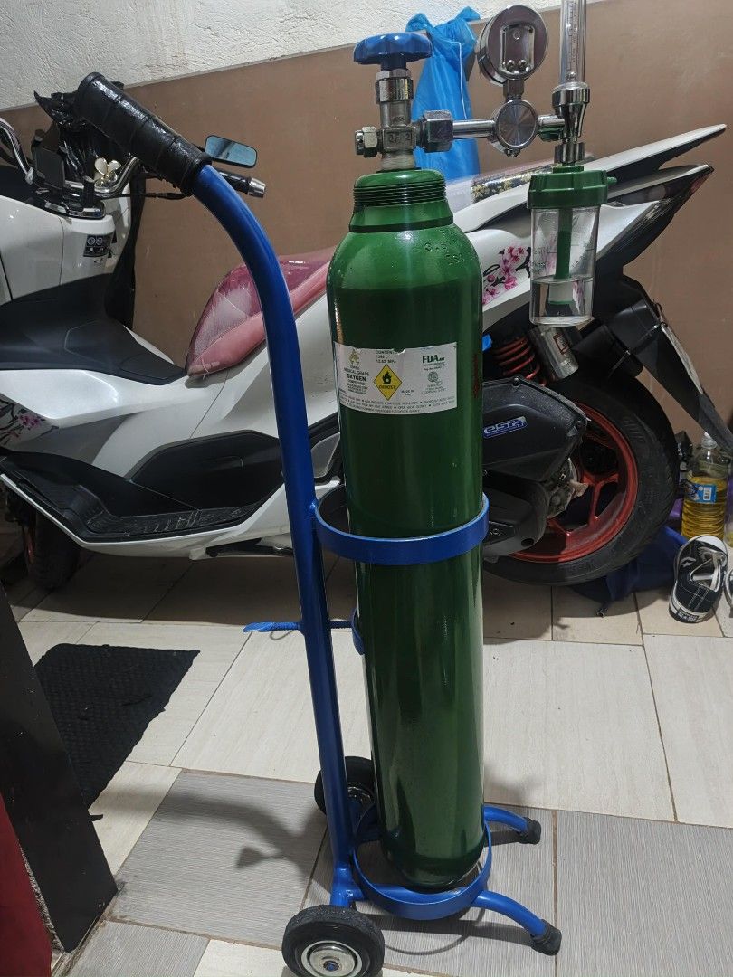 MC Oxygen Regulator with Tank and Trolley (Category: Medical Supplies & Tools) located in Pasig City. Submitted by urbanvoghue (Listing ID 1461116423, Image 1). Description: 13.4 Liter Portable Medical Oxygen Tank Assembly with Trolley and Regulator. ​Medical Oxygen Tank (Cylinder) ​Capacity / Volume: 1348 ​Material: Seamless Steel (painted standard medical green) MC brand -​Oxygen Regulator & Flowmeter Unit ​Trolley Cart ​Construction: Powder-co