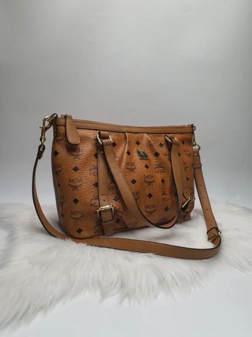 MCM Munchen Visetos Cognac Monogram Tote Bag (Category: Activewear) located in Manila. Submitted by aftermarketphilippines (Listing ID 1461174180, Image 3). Description: MCM Munchen Visetos Cognac Monogram Tote Bag 9.5/10 (Good As New) No issue Used Price : 10,000 HMU Location : San Juan.