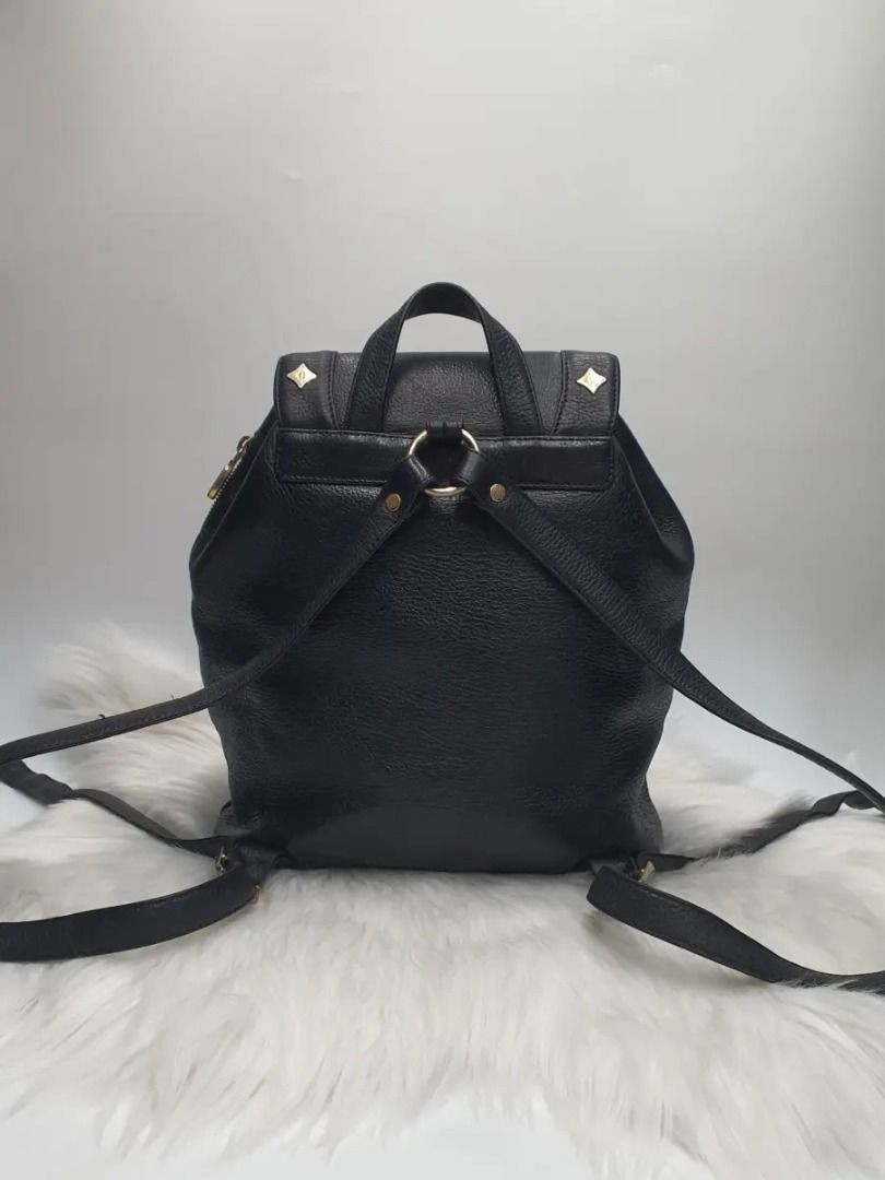 MCM Munchen Visetos Vintage Black Magnetic Backpack Bag (Category: Activewear) located in Manila. Submitted by aftermarketphilippines (Listing ID 1461178608, Image 2). Description: MCM Munchen Visetos Vintage Black Magnetic Backpack Bag 9.5/10 (Good As New) No issue Used Price : 9000 HMU Location: San Juan City .