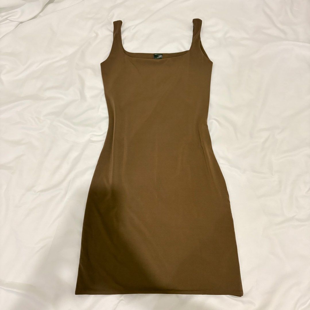 MERA Brown Body hugging dress (Category: Dresses) located in Manila. Submitted by t_a_s_h (Listing ID 1461224390, Image 1). Description: - Used once only .