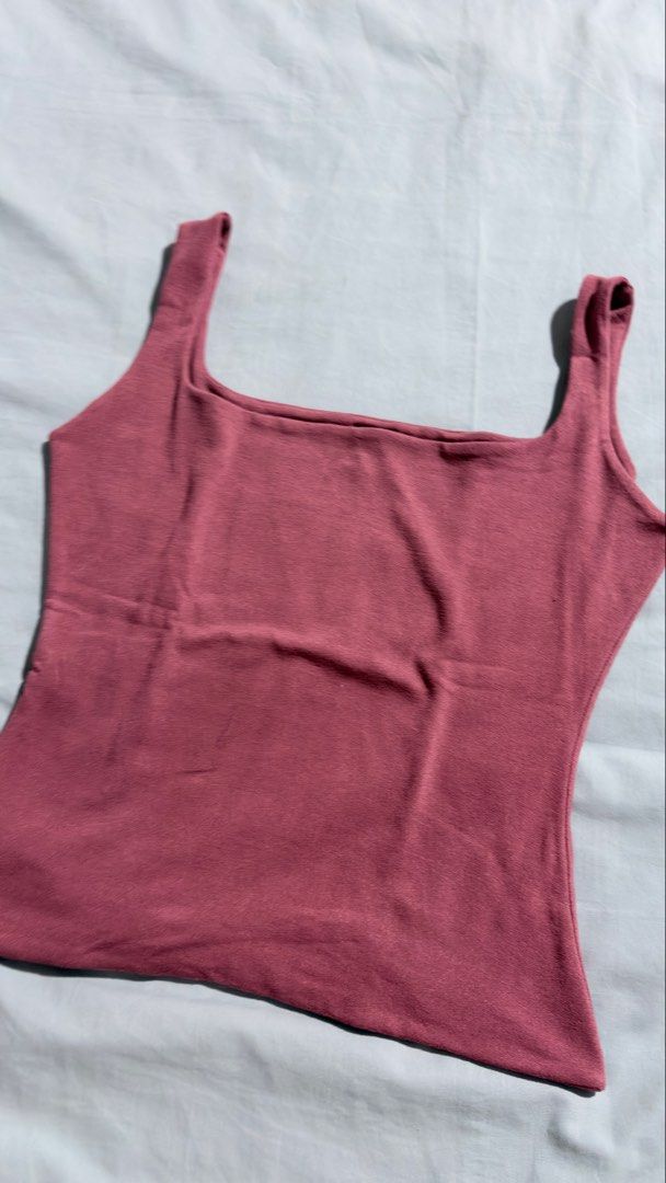 MERA Square Neck Tank Tops (2 pcs) (Category: Sleeveless) located in Iloilo. Submitted by kathiesboutique.ilo (Listing ID 1461321215, Image 2). Description: - Brand: MERA - Size: Medium (M) - Made in the Philippines - Available Colors: Dusty Rose, White - Neckline: Square - Material: Soft, stretchy fabric - Versatile: Great for layering or wearing on its own - Style: Essential basic for any wardrobe Buy 1 (₱250 each) Buy both for (₱400).