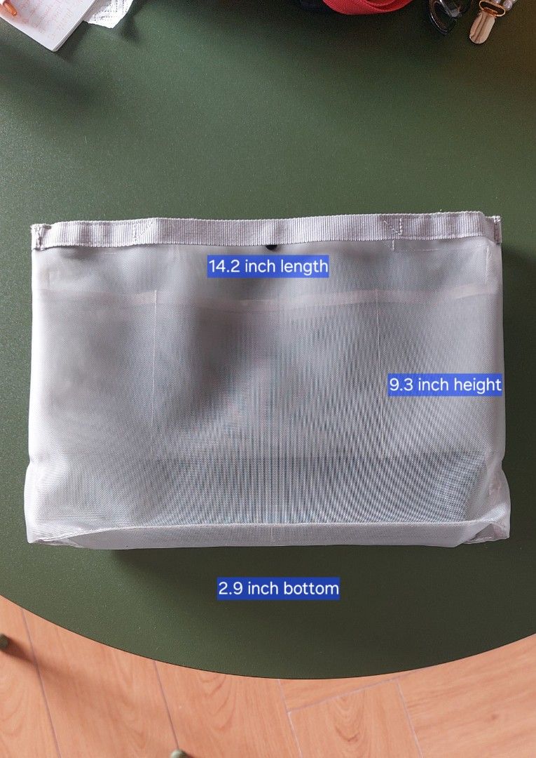 Mesh Storage Bag Organizer with Snap Closure (Category: Storage Boxes & Baskets) located in Taguig. Submitted by sdavid1988 (Listing ID 1461183357, Image 1). Description: - Lightweight mesh organizer bag - Features convenient side snap closures - Easy to see contents through the mesh material - Folds flat for compact storage when not in use - Approximate dimensions: 14.2" L x 9.3" H x 2.9" W.