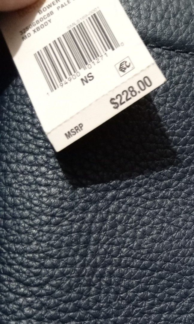 Michael Kors Navy Blue Crossbody Bag (Category: Luxury Bags & Wallets) located in Paranaque City. Submitted by chrisyel (Listing ID 1461220296, Image 3). Description: Michael Kors Navy Blue Crossbody Bag 👜✨ • Used once only • In very good / like-new condition • Gift from my aunt from Las Vegas, USA 🇺🇸 • Navy blue with MK monogram design • Long adjustable strap • No visible stains or damage • Original tag no longer available • I have a photo of