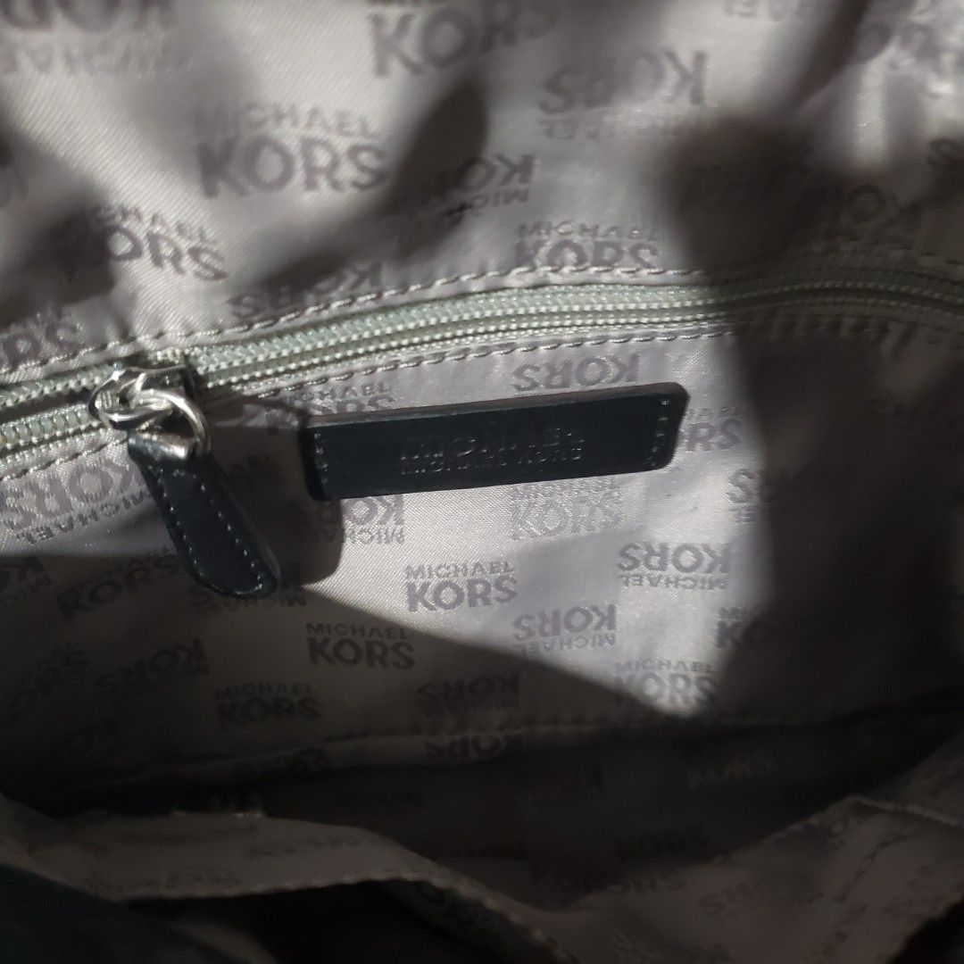 Michael Kors Quilted Leather Chain Shoulder Bag (Category: Luxury Bags & Wallets) located in Manila. Submitted by poshcara (Listing ID 1461261782, Image 3). Description: - Michael Kors black quilted leather shoulder bag - Silver chain strap - Turn-lock closure with Michael Kors logo - Interior: Michael Kors branded lining - Interior: One zip pocket - Versatile for everyday use or nights out.
