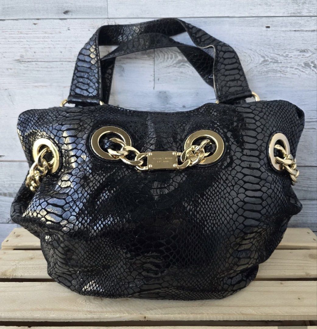Michael Kors Shoulder Bag (Category: Shoulder Bags) located in Quezon City. Submitted by babybutton2018 (Listing ID 1461135164, Image 1). Description: Michael Kors Snakeprint Shoulder Bag Used only a few times, like new condition Bought in NY.