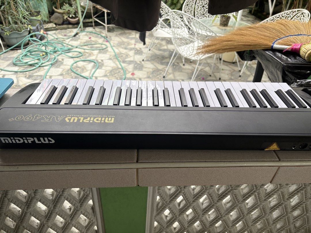 MIDI PLUS AK490+ MIDI Keyboard Controller with Bag (Category: Musical Instruments) located in Batangas. Submitted by samvelasquez0 (Listing ID 1461122383, Image 2). Description: - MIDI PLUS AK490+ 49-key MIDI Keyboard Controller - Perfect for music production - Features pitch and modulation wheels - Includes octave buttons for expanded range - Connects easily via USB - Sustain switch input - MIDI ports for versatile connectivity - Comes with a co