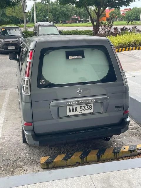 Mitsubishi Adventure Manual (Category: Used Cars) located in Caloocan City. Submitted by wiseshark.f655da (Listing ID 1461276460, Image 3). Description: "Alagang May-ari" 1st Owner: 2014 Mitsubishi Adventure GLX Description:Selling our reliable, first-owned 2014 Mitsubishi Adventure GLX. Perfect family vehicle or business workhorse known for its durability, cold dual air conditioning, and fuel-efficient diesel engine. Vehicle Details:Ownership: 1