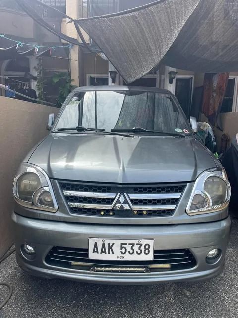 Mitsubishi Adventure Manual (Category: Used Cars) located in Caloocan City. Submitted by wiseshark.f655da (Listing ID 1461276460, Image 2). Description: "Alagang May-ari" 1st Owner: 2014 Mitsubishi Adventure GLX Description:Selling our reliable, first-owned 2014 Mitsubishi Adventure GLX. Perfect family vehicle or business workhorse known for its durability, cold dual air conditioning, and fuel-efficient diesel engine. Vehicle Details:Ownership: 1