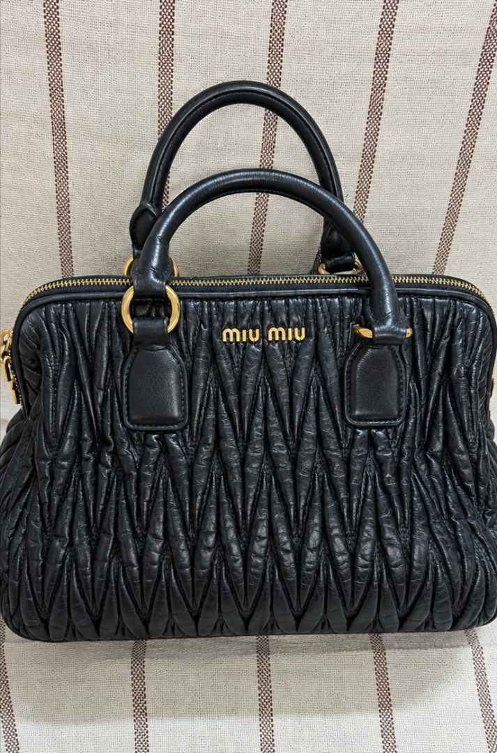 Miu miu (Category: Luxury Bags & Wallets) located in Bontoc. Submitted by athena_zia (Listing ID 1461245968, Image 1). Description: Miu Miu Matelasse hand bag Genuine leather Perfect for every day used with minimal sign of wears code and lampo Zipper kindly PM for more detailed photos,❤️ 📌 Shipping via JNt 📌 Maharlika 2nd floor.