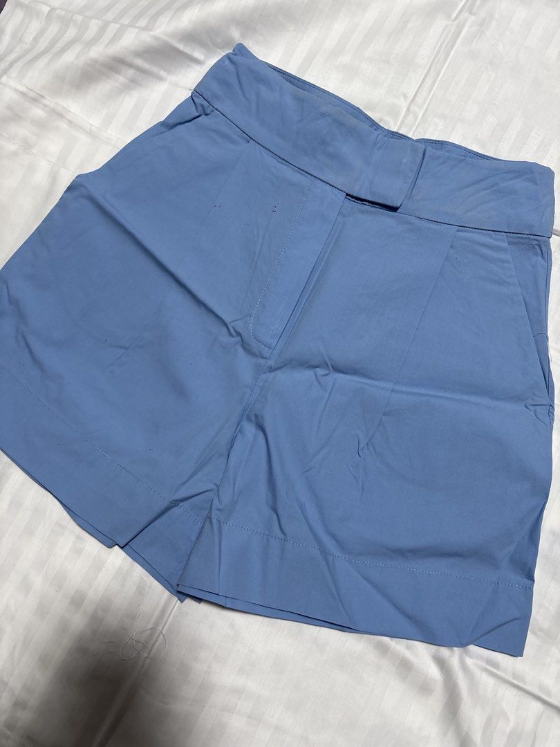 MNG Blue Tailored Shorts Size XS (Category: Shorts) located in Pasay City. Submitted by nicoletlntn_ (Listing ID 1461236020, Image 1). Description: - MNG tailored shorts - Color: Blue - Size: XS - Features: Pockets, button closure at waist - Style: Simple, classic, versatile for casual or dressed-up occasions.