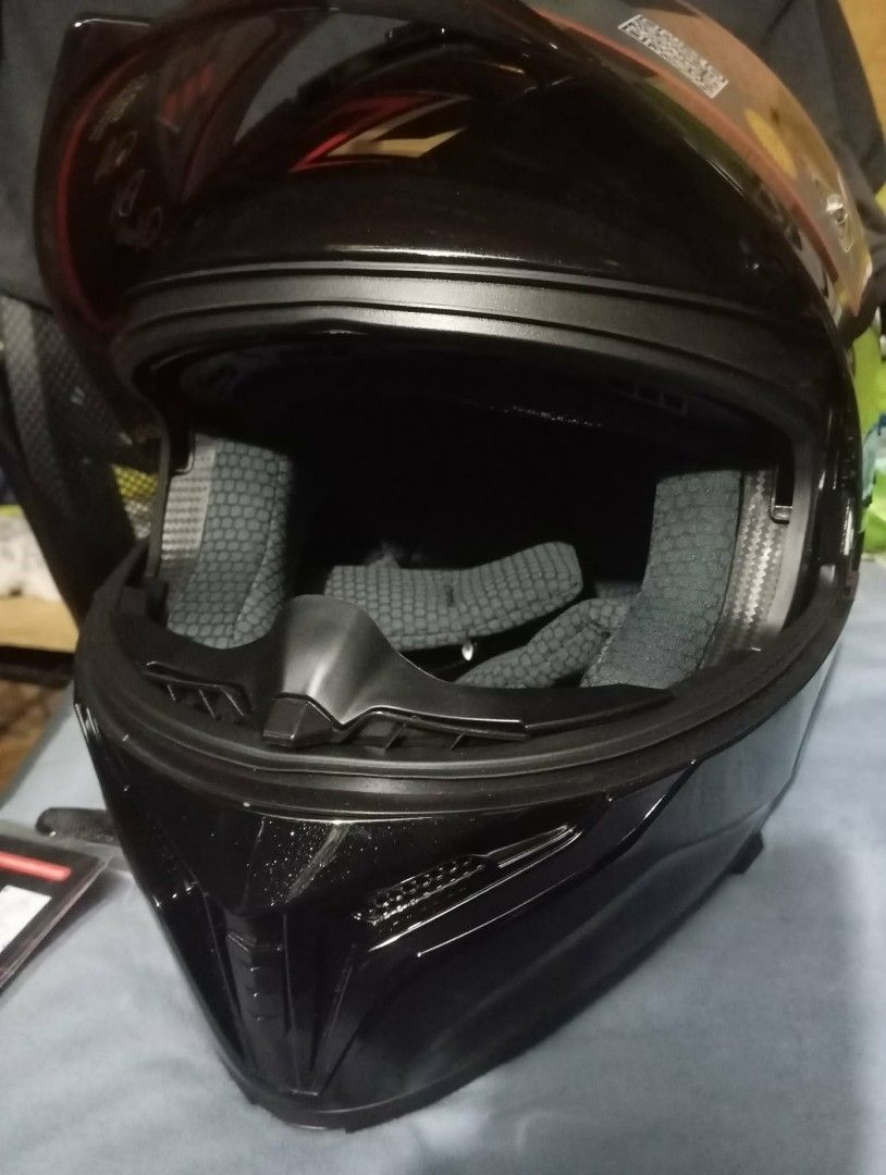 Modular zebra helmet glossy black with pearl scale (Category: Helmets and other Riding Gears) located in Manila. Submitted by elililyxx (Listing ID 1461276456, Image 3). Description: 2800 nalang. Modular zebra. Glossy black with pearl scale. 2 visor. Smoked night vision shield. May kabitan ng eyeglases at bluetooth intercom ready na din. Walang gasgas and no issue. for meetup only sm grand central or new caloocan city hall.