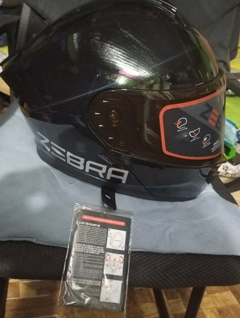 Modular zebra helmet glossy black with pearl scale (Category: Helmets and other Riding Gears) located in Manila. Submitted by elililyxx (Listing ID 1461276456, Image 1). Description: 2800 nalang. Modular zebra. Glossy black with pearl scale. 2 visor. Smoked night vision shield. May kabitan ng eyeglases at bluetooth intercom ready na din. Walang gasgas and no issue. for meetup only sm grand central or new caloocan city hall.
