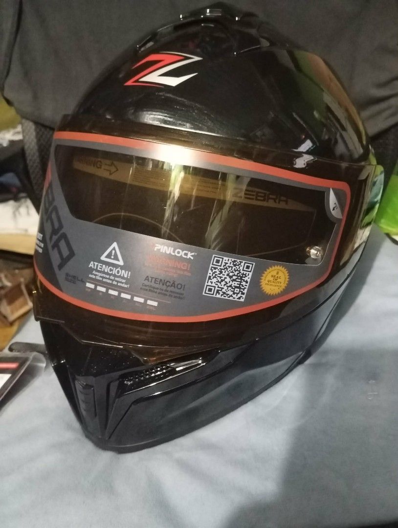 Modular zebra helmet glossy black with pearl scale (Category: Helmets and other Riding Gears) located in Manila. Submitted by elililyxx (Listing ID 1461276456, Image 2). Description: 2800 nalang. Modular zebra. Glossy black with pearl scale. 2 visor. Smoked night vision shield. May kabitan ng eyeglases at bluetooth intercom ready na din. Walang gasgas and no issue. for meetup only sm grand central or new caloocan city hall.