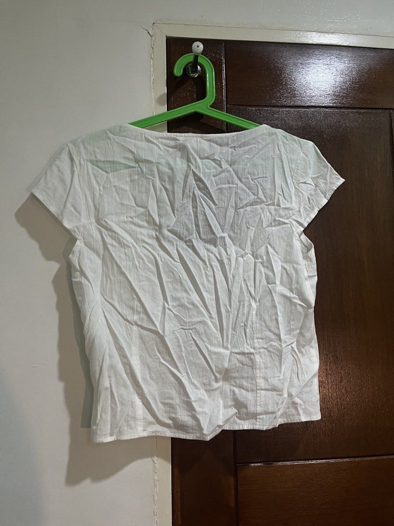 Monki White Button-Up Short Sleeve Top Size 38 (Category: Blouses) located in Pasig City. Submitted by kakerts (Listing ID 1461278153, Image 2). Description: - Brand: Monki - Color: White - Sleeve Length: Short Sleeve - Neckline: Scoop Neck - Closure: Button-up Front - Material: 100% Cotton - Features: Comfortable, Breathable - Occasion: Casual or Dressy - Size: 38 - Made in: India.