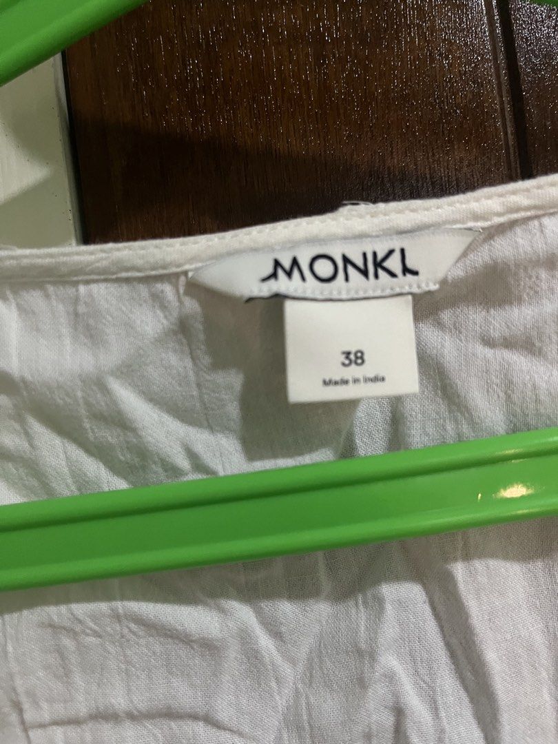 Monki White Button-Up Short Sleeve Top Size 38 (Category: Blouses) located in Pasig City. Submitted by kakerts (Listing ID 1461278153, Image 3). Description: - Brand: Monki - Color: White - Sleeve Length: Short Sleeve - Neckline: Scoop Neck - Closure: Button-up Front - Material: 100% Cotton - Features: Comfortable, Breathable - Occasion: Casual or Dressy - Size: 38 - Made in: India.