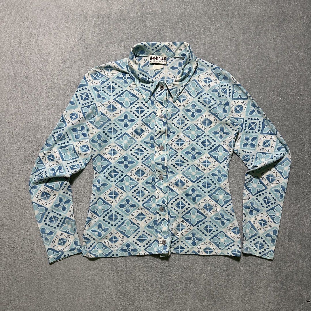 Morgan de Toi Blue Geometric Print Button Up Shirt (Category: Shirts) located in Bayombong. Submitted by rochelle_archive_garments (Listing ID 1461322521, Image 1). Description: - Morgan de Toi button-up shirt - Eye-catching blue and white geometric pattern - Long sleeves with a classic pointed collar - Stretchy fabric for comfort - Perfect for dressing up or down.
