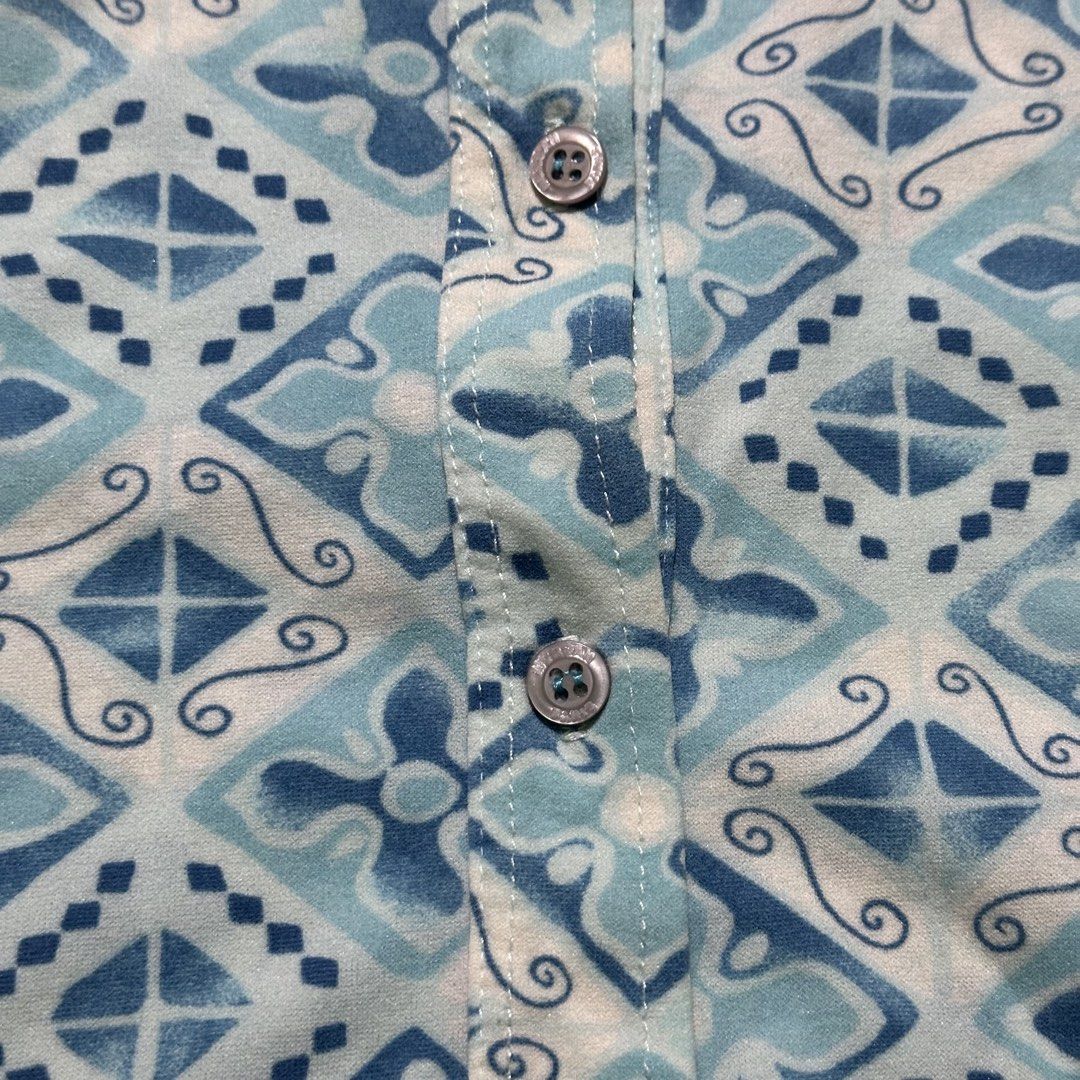 Morgan de Toi Blue Geometric Print Button Up Shirt (Category: Shirts) located in Bayombong. Submitted by rochelle_archive_garments (Listing ID 1461322521, Image 3). Description: - Morgan de Toi button-up shirt - Eye-catching blue and white geometric pattern - Long sleeves with a classic pointed collar - Stretchy fabric for comfort - Perfect for dressing up or down.