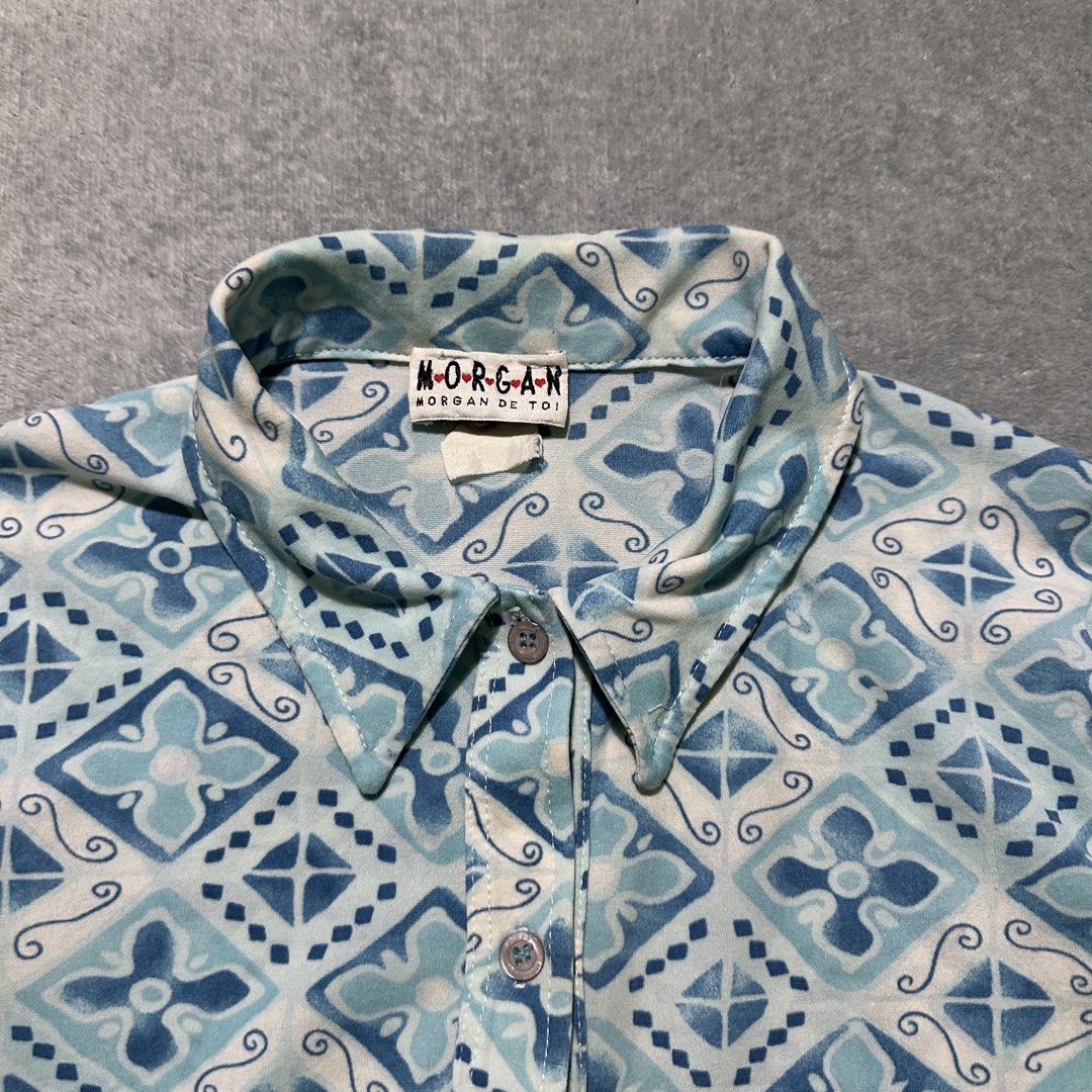 Morgan de Toi Blue Geometric Print Button Up Shirt (Category: Shirts) located in Bayombong. Submitted by rochelle_archive_garments (Listing ID 1461322521, Image 2). Description: - Morgan de Toi button-up shirt - Eye-catching blue and white geometric pattern - Long sleeves with a classic pointed collar - Stretchy fabric for comfort - Perfect for dressing up or down.