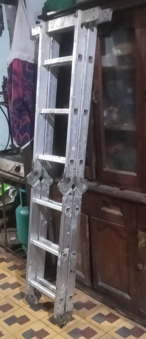 Multi-purpose Aluminum Ladder (Category: Other Home Furniture) located in Makati City. Submitted by jared.jared (Listing ID 1461237998, Image 1). Description: - Sturdy multi-purpose aluminum ladder - Ideal for home improvement or work tasks - Highly configurable for different needs - Shows some signs of use, but fully functional - Ready for its next owner.