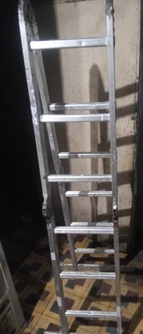 Multi-purpose Aluminum Ladder (Category: Other Home Furniture) located in Makati City. Submitted by jared.jared (Listing ID 1461237998, Image 3). Description: - Sturdy multi-purpose aluminum ladder - Ideal for home improvement or work tasks - Highly configurable for different needs - Shows some signs of use, but fully functional - Ready for its next owner.