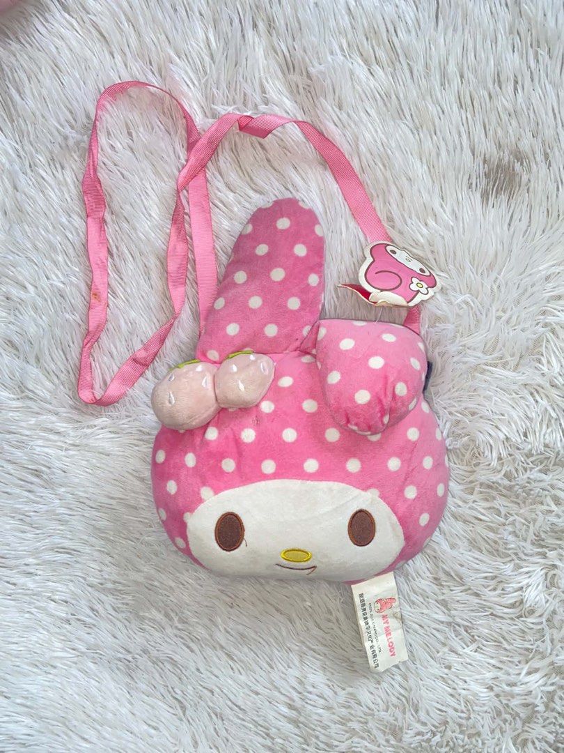 My Melody sling bag (Category: Cross-body Bags) located in San Antonio. Submitted by nanachan.01 (Listing ID 1461132598, Image 1). Description: - has tiny hole - as is.