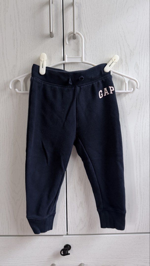 Navy Blue GAP Jogger Pants (Category: Babies & Kids Fashion) located in Cabuyao City. Submitted by 11two_one (Listing ID 1461186111, Image 1). Description: - original Navy blue joggers from GAP - Light pink GAP logo on the left leg - bought @ Moa Gap Size 2t.