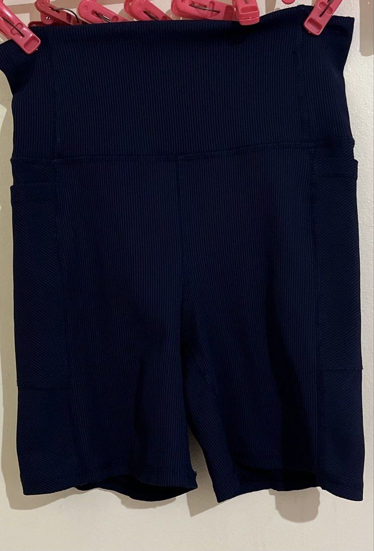 Navy Blue Ribbed Biker Shorts with Pockets (Category: Shorts) located in Quezon City. Submitted by abssnf (Listing ID 1461302317, Image 2). Description: - Navy blue ribbed biker shorts - High-waisted design - Convenient pockets on both sides - Comfortable and stretchy material - Versatile for workouts, gym, or casual errands.