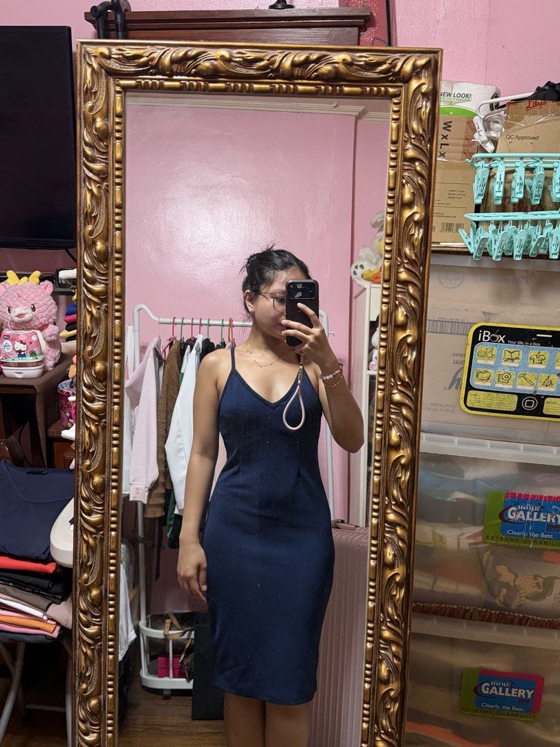 Navy Blue Spaghetti Strap Midi Dress (Category: Dresses) located in Manila. Submitted by mongosoleigh (Listing ID 1461263958, Image 1). Description: - Simple navy blue midi dress - Features spaghetti straps and a V-neckline - Made with stretchy, body-hugging material - Perfect for dressing up or down - Ideal for a night out or casual day - Easy to accessorize.